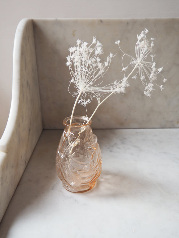 Vase en verre rose